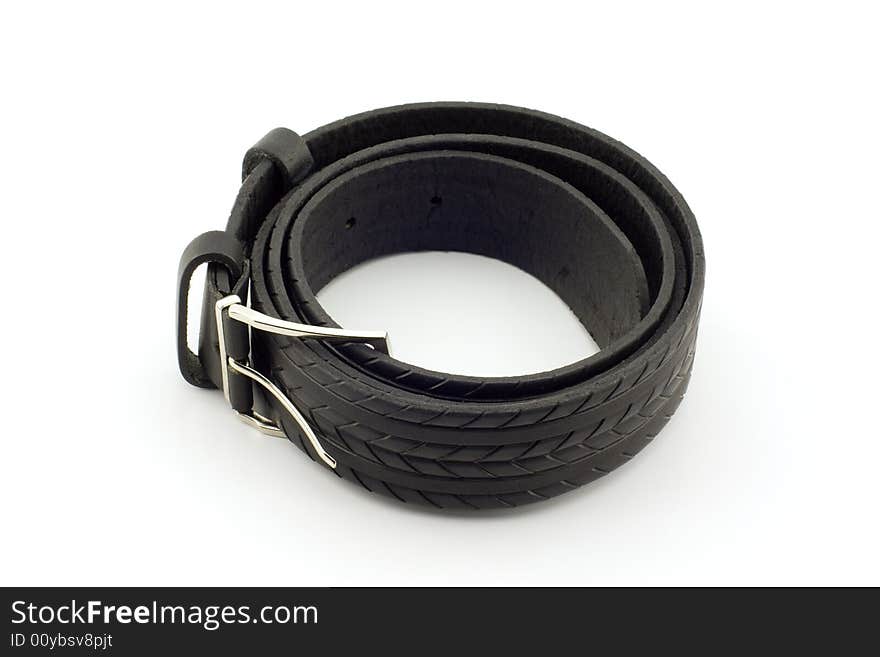 Rolled leather belt, white background. Rolled leather belt, white background