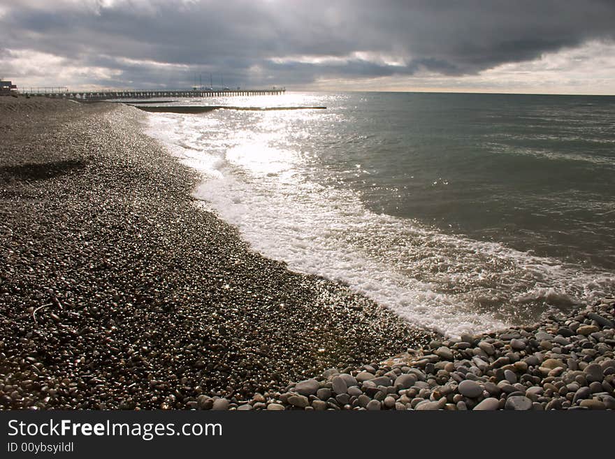 Seashore with shingle, wintertime