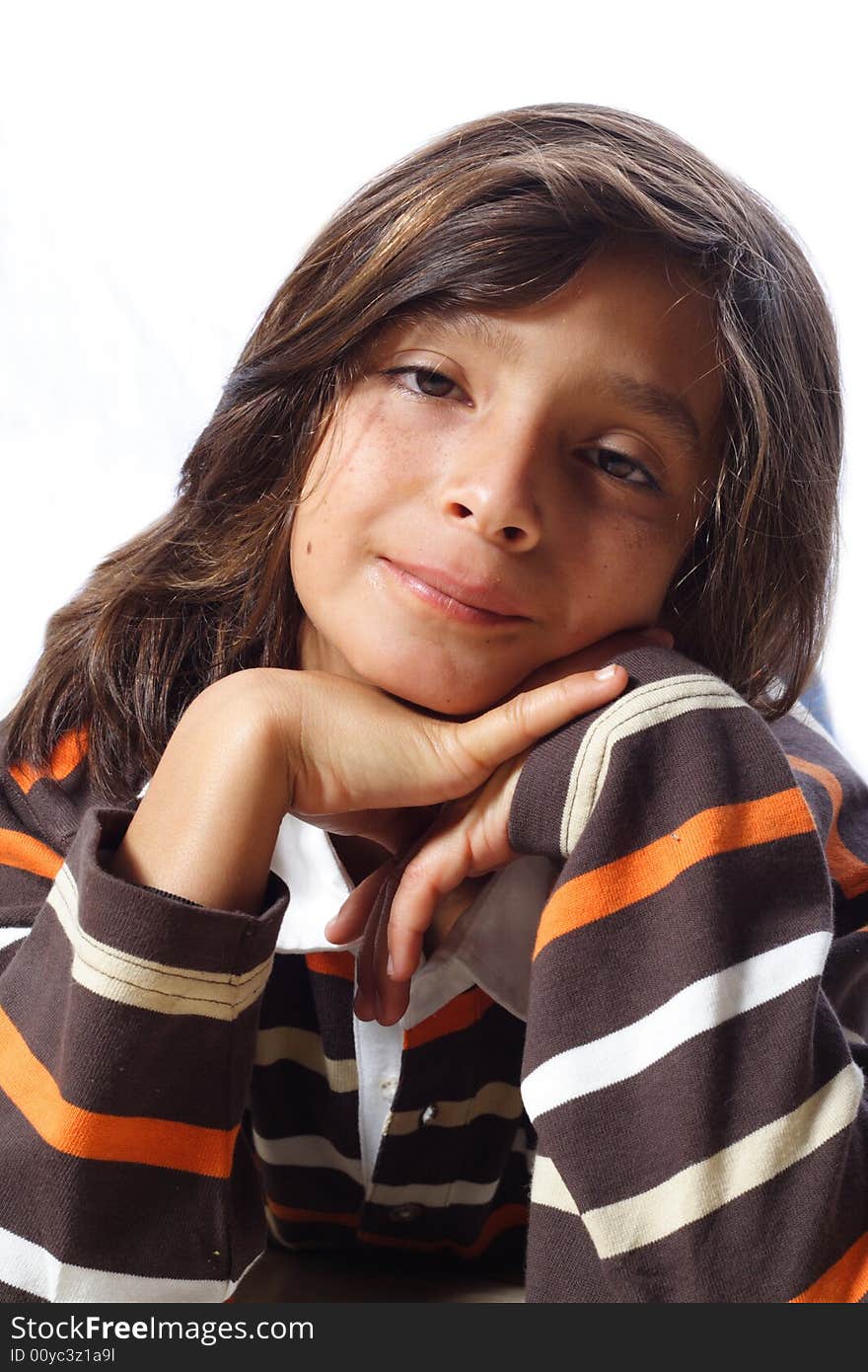 Headshot of a young child isolated on white.