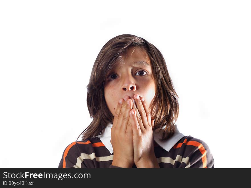 Young Child covering his mouth. Young Child covering his mouth.