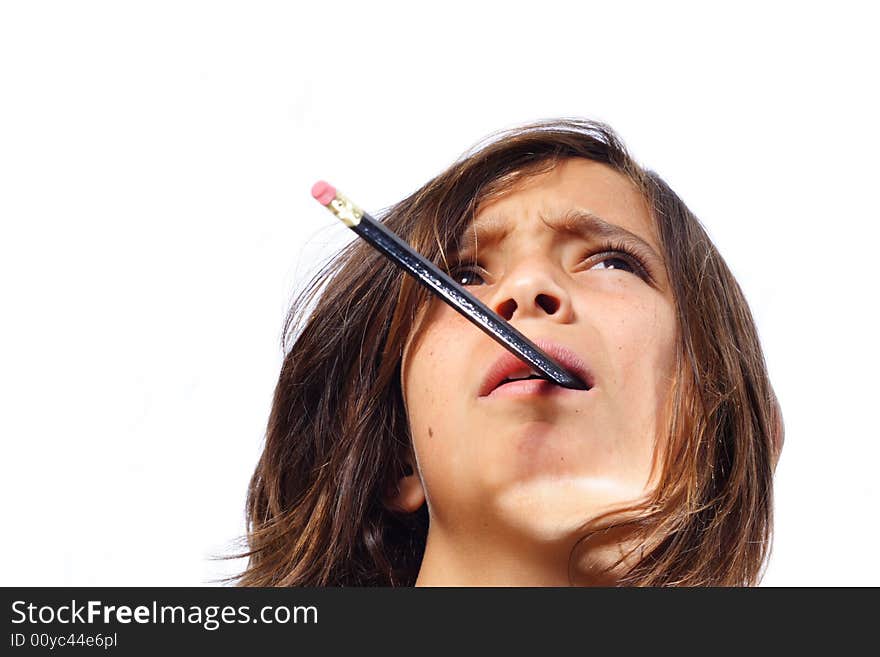 Young child with a pencil sticking out of his mouth. Young child with a pencil sticking out of his mouth.