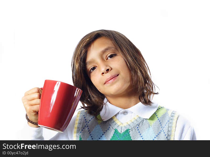 Young Trendy boy holding up a red mug. Young Trendy boy holding up a red mug