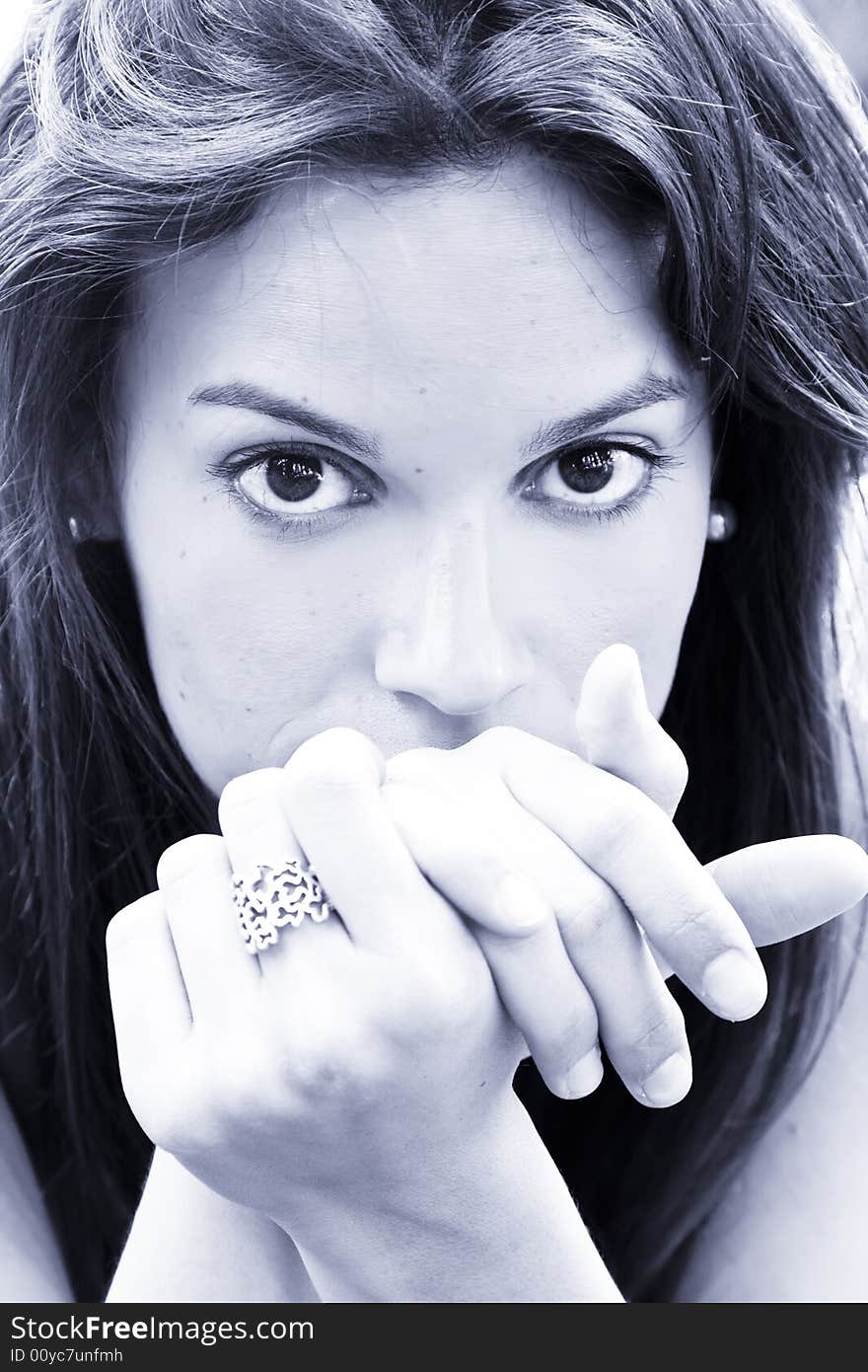 Young woman portrait, toned in blue.