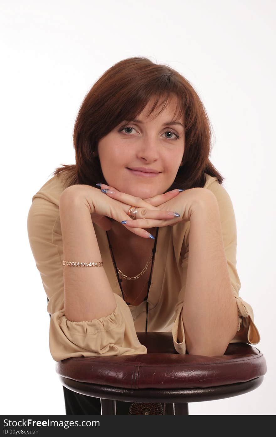 Portrait of the young woman on a white background