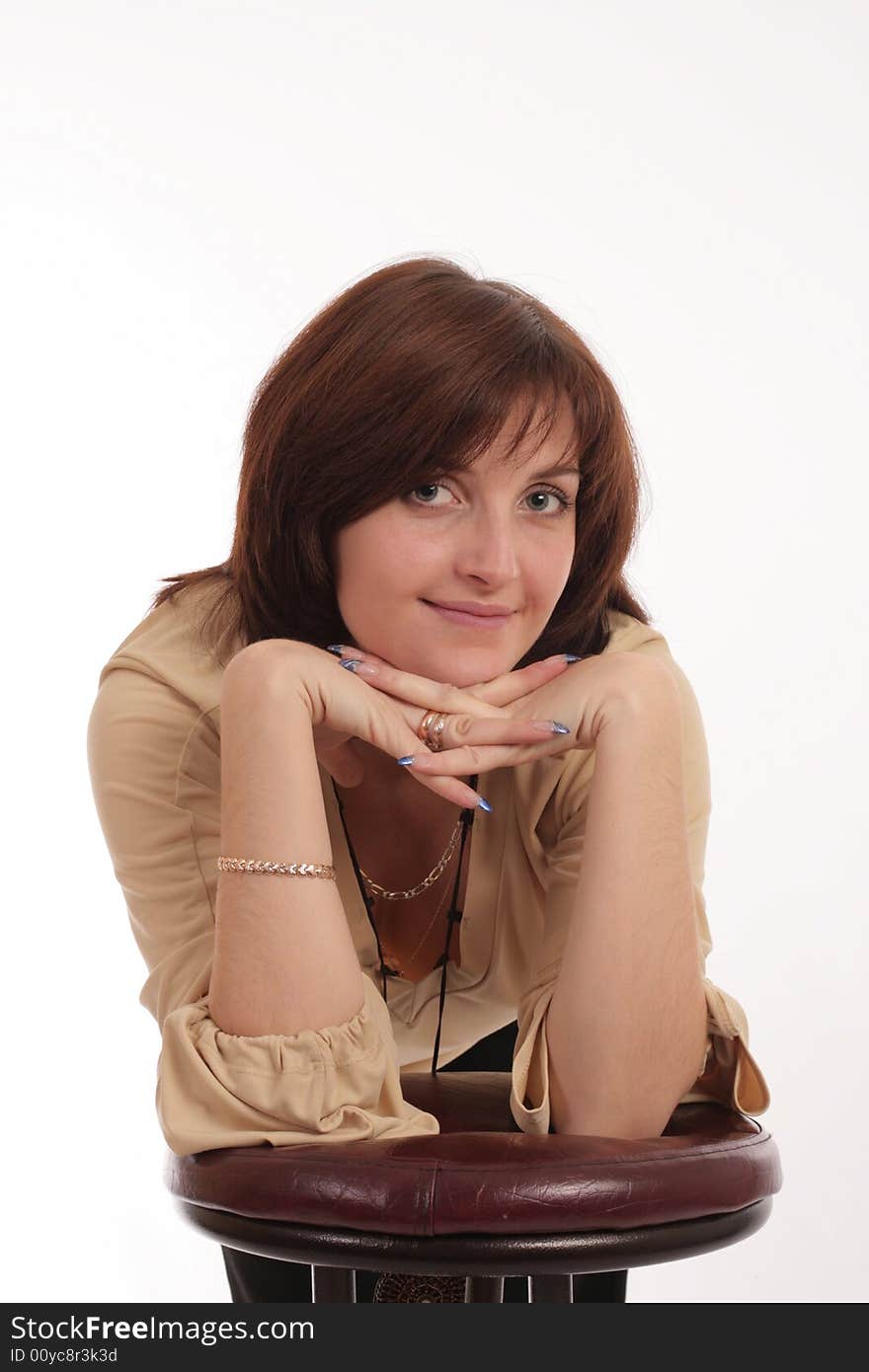 Portrait of the young woman on a white background