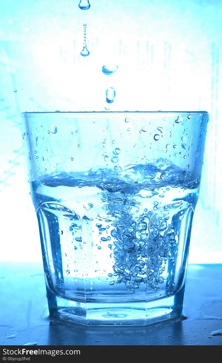 Blue glass and water splash