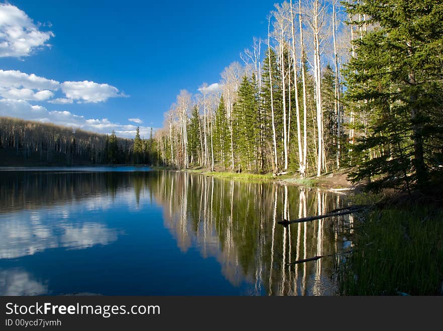 Glassy vacation lake in glorious untouched mountain range