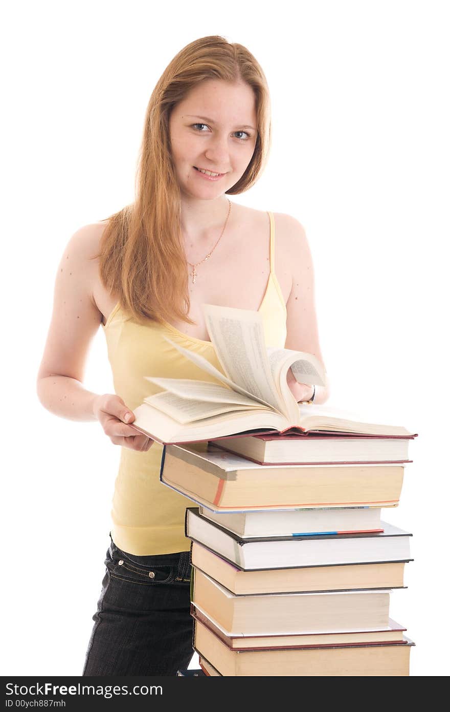 The young student with the books isolated on a white background