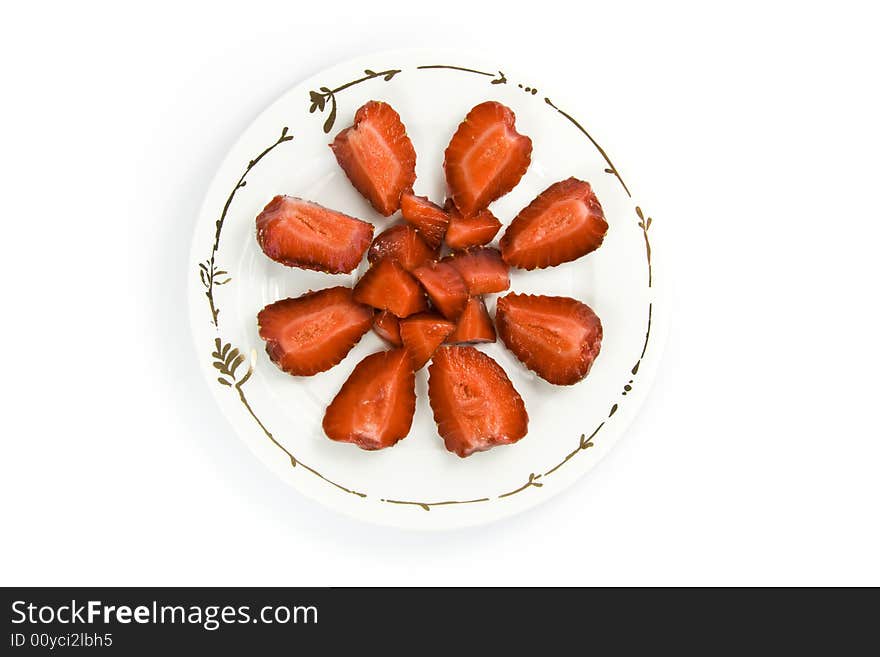 Sliced strawberries on plate