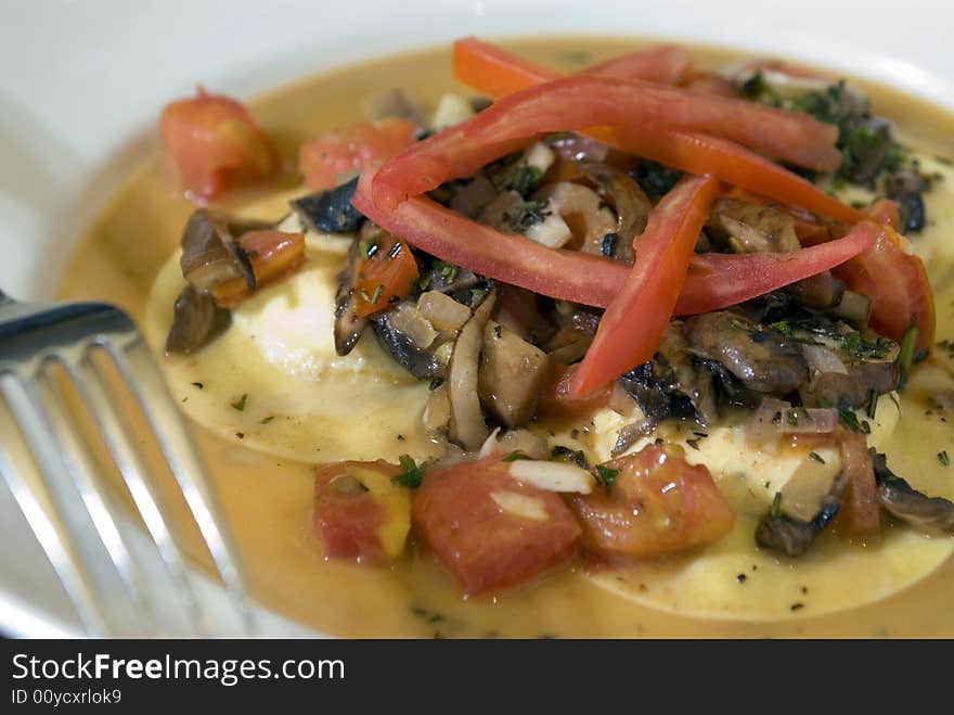 Ravioli with heirloom tomatoes and organic mushrooms. Ravioli with heirloom tomatoes and organic mushrooms