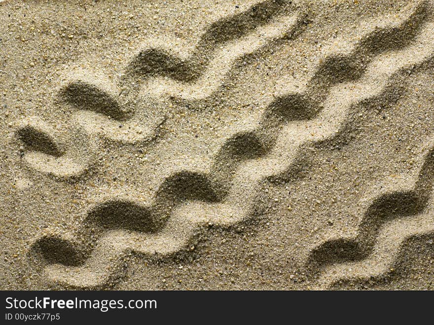 Simple pattern on sand surface. Simple pattern on sand surface