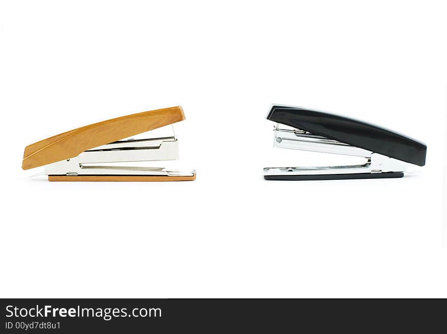 Isolated photo of black and brown staplers