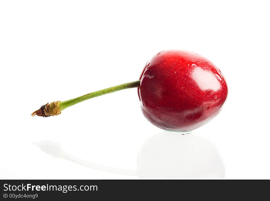 An image of red cherry isolated on white. An image of red cherry isolated on white