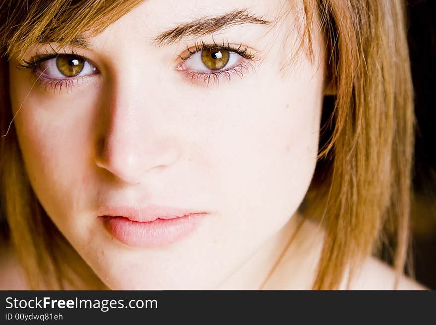 Young woman close portrait, high key