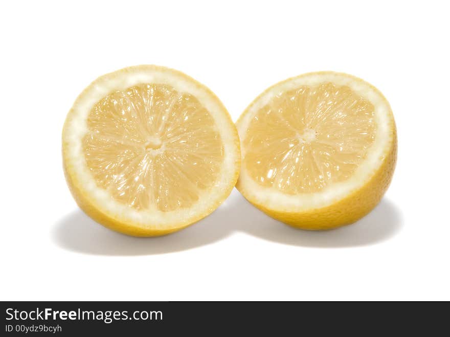 Fresh cut lemon on white background