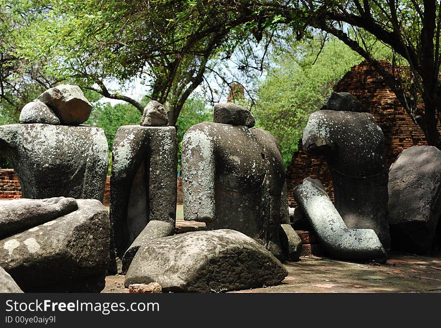 In Thailand the city of Ayutthaya was founded in 1350 today is an impressive archaeological park; here a view of the Wat Ratburana or Ratchaburana ruins built in 1424 with ancient seated Buddhas
; Here an ancient statue of Buddha. In Thailand the city of Ayutthaya was founded in 1350 today is an impressive archaeological park; here a view of the Wat Ratburana or Ratchaburana ruins built in 1424 with ancient seated Buddhas
; Here an ancient statue of Buddha