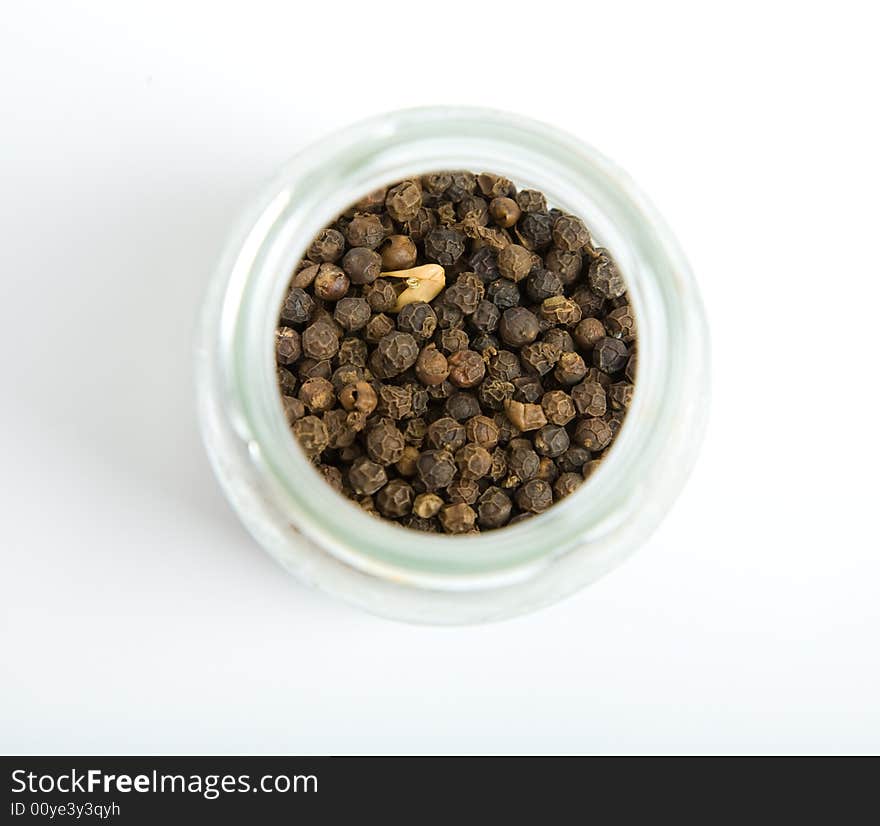 Black pepper in close-up isolated