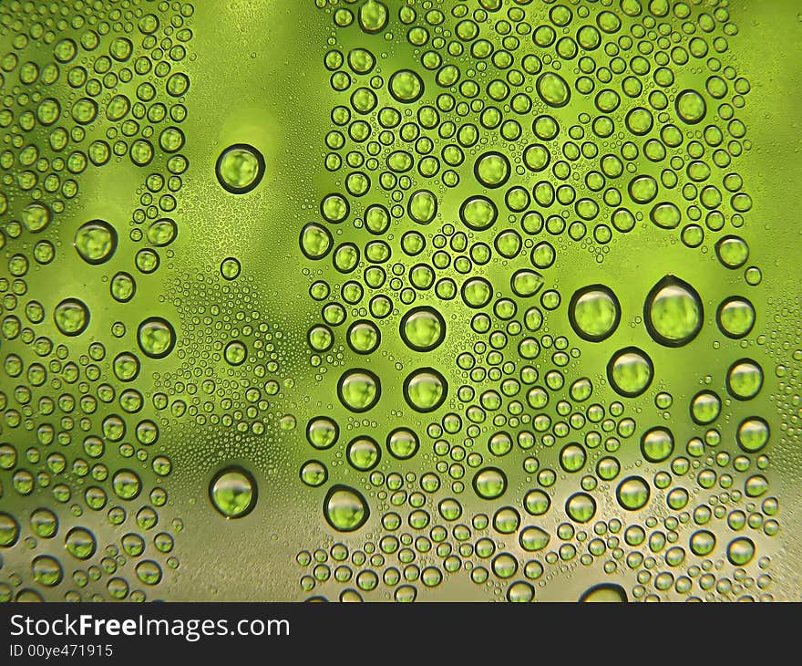 Drops of watwer on green background. Drops of watwer on green background