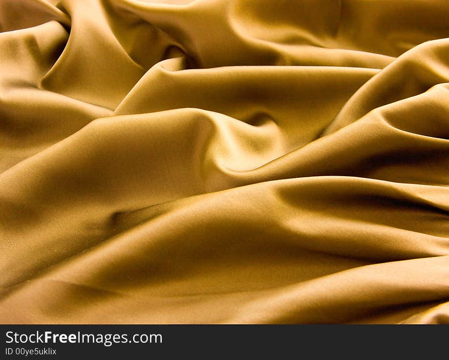 Abstract satin background colored with yellow. Abstract satin background colored with yellow