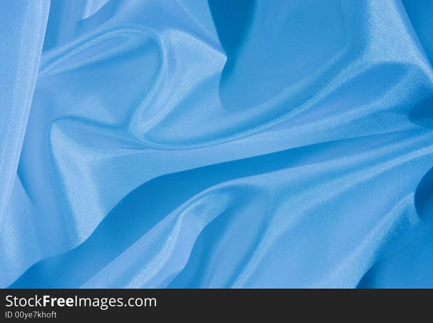 Nice Abstract satin background toned with blue