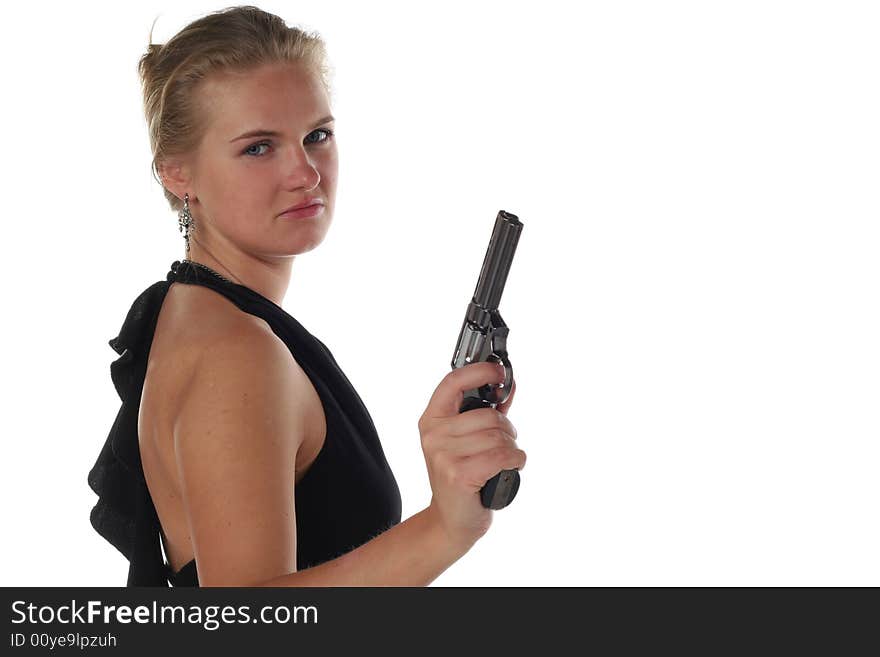 Young blond woman in black dress with revolver isolated on white background. Young blond woman in black dress with revolver isolated on white background