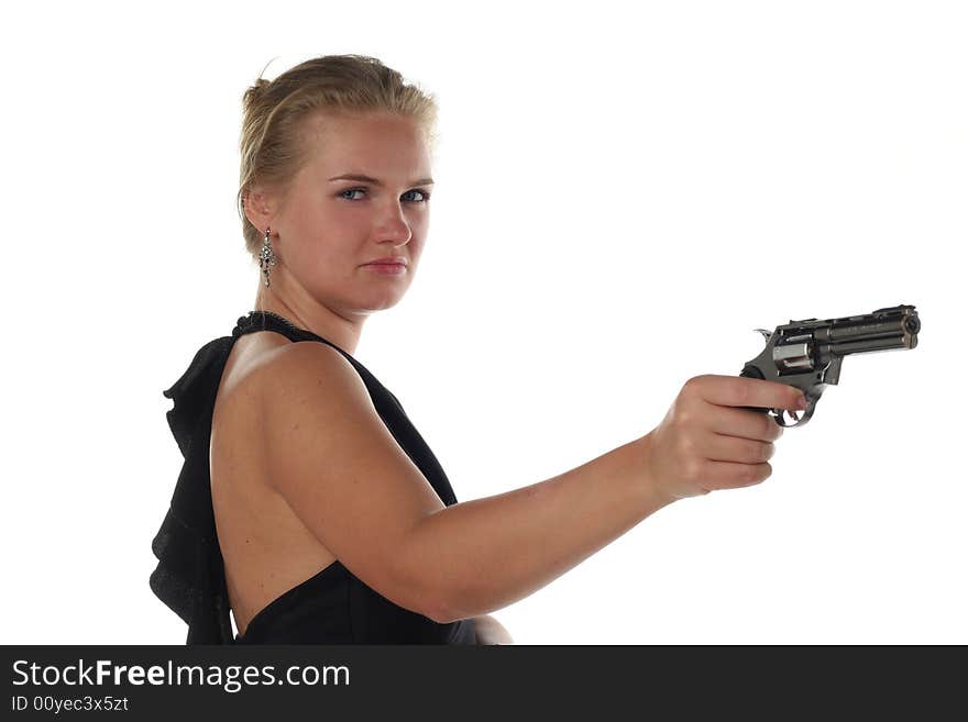 Young blond woman in black dress with revolver isolated on white background. Young blond woman in black dress with revolver isolated on white background