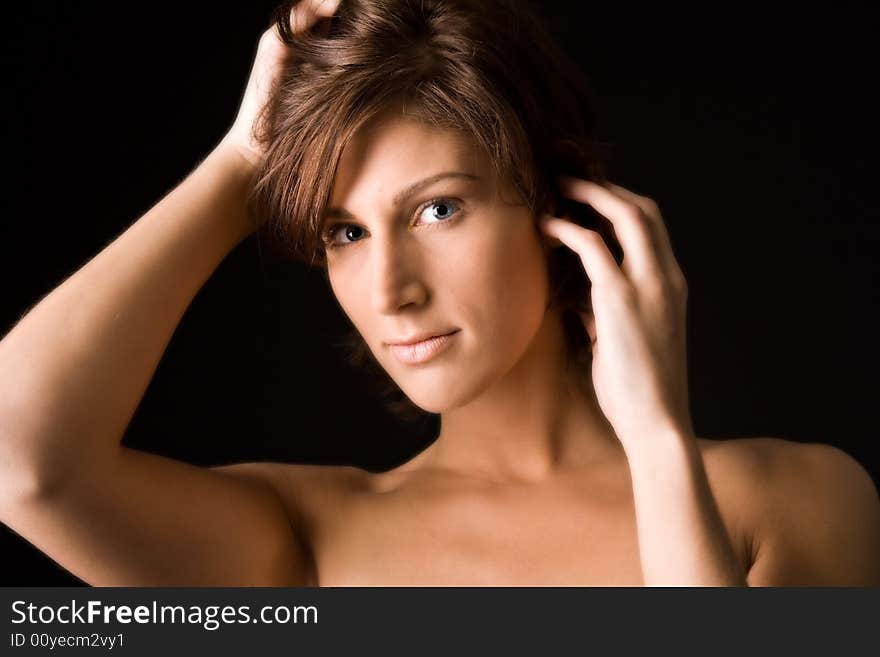 Studio portrait of a pretty brunette lady. Studio portrait of a pretty brunette lady