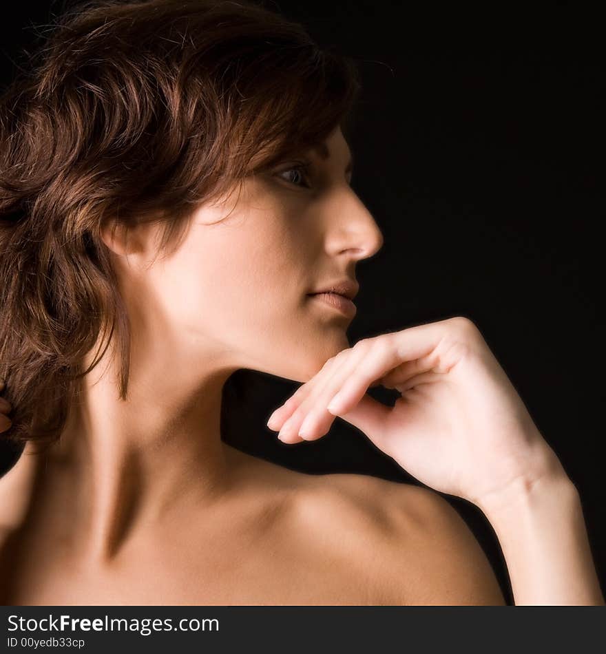 Studio portrait of a pretty brunette lady. Studio portrait of a pretty brunette lady