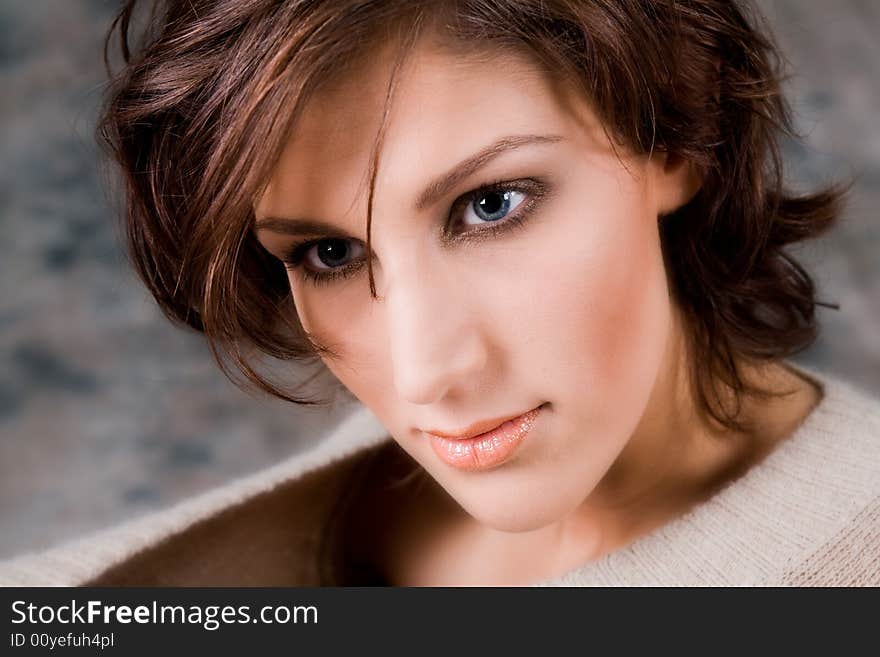 Studio portrait of a pretty brunette lady. Studio portrait of a pretty brunette lady