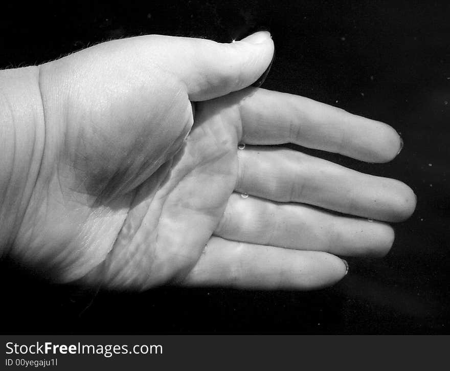 Opened hand on a background water. Opened hand on a background water