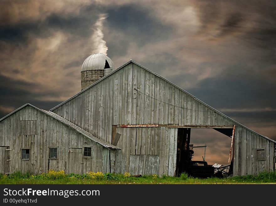 Old barn at sunset time. Old barn at sunset time.