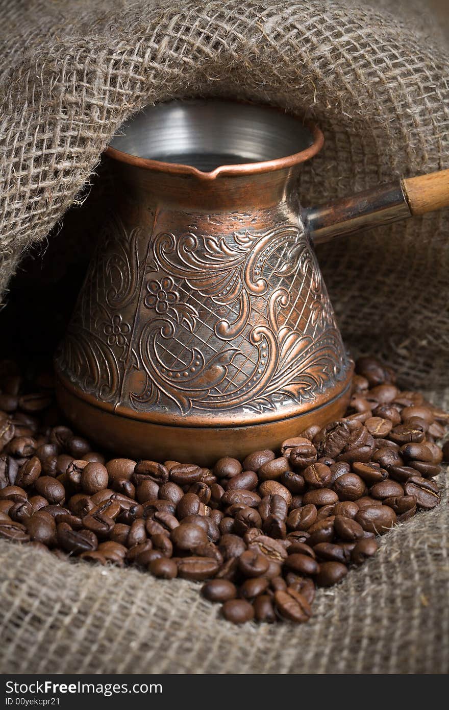 Cezve with freshly roasted coffee beans