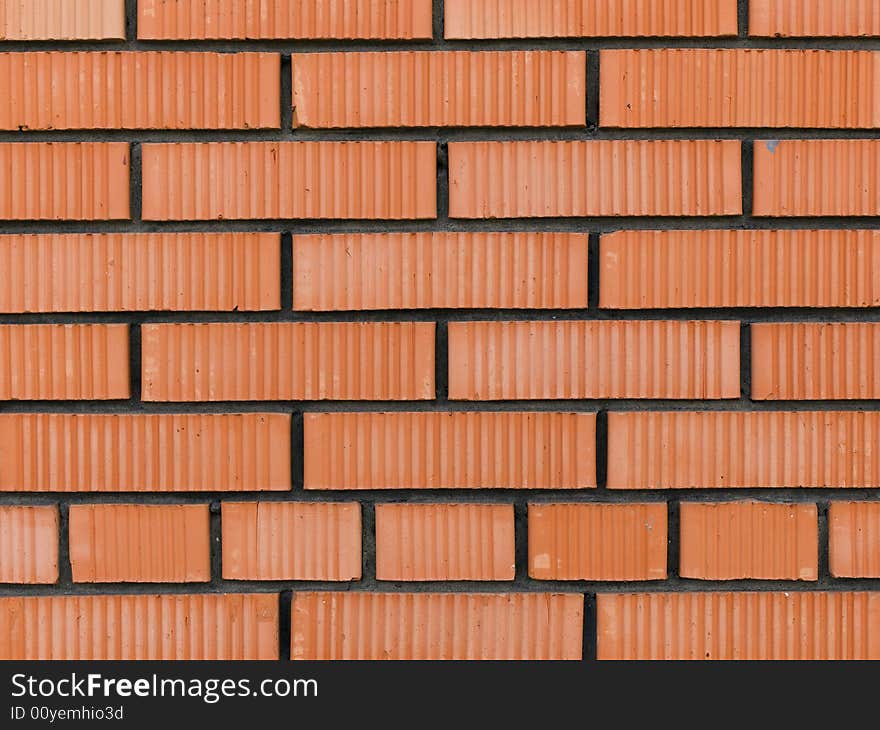 Wall made of red and yellow bricks. Wall made of red and yellow bricks