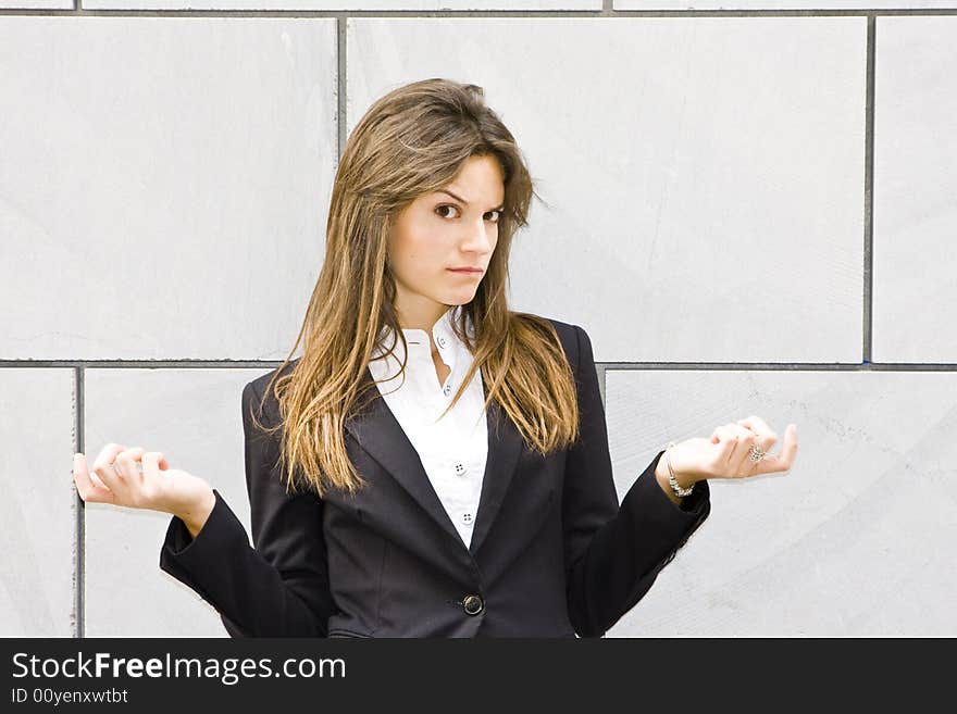 Doubtful businesswoman, isolated on white