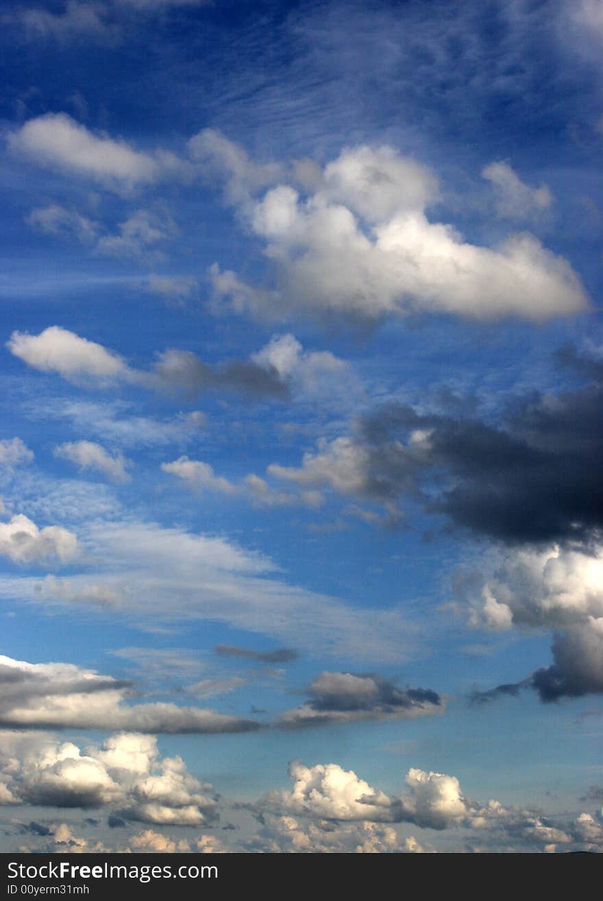 Clouds in a bright blue sky