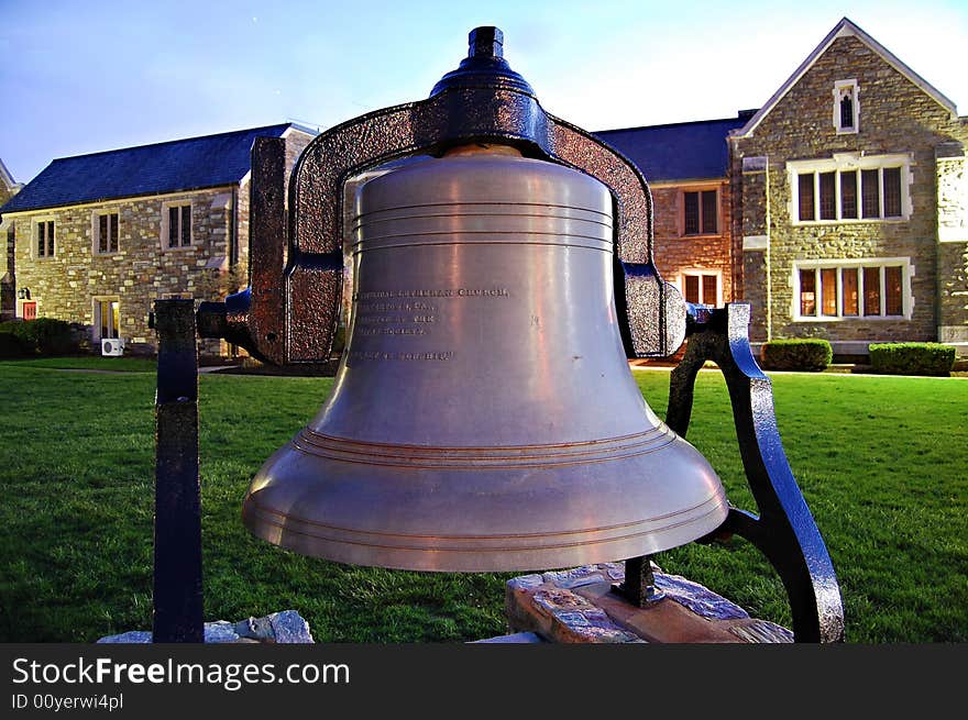 Beautiful old church bell standing in church yard