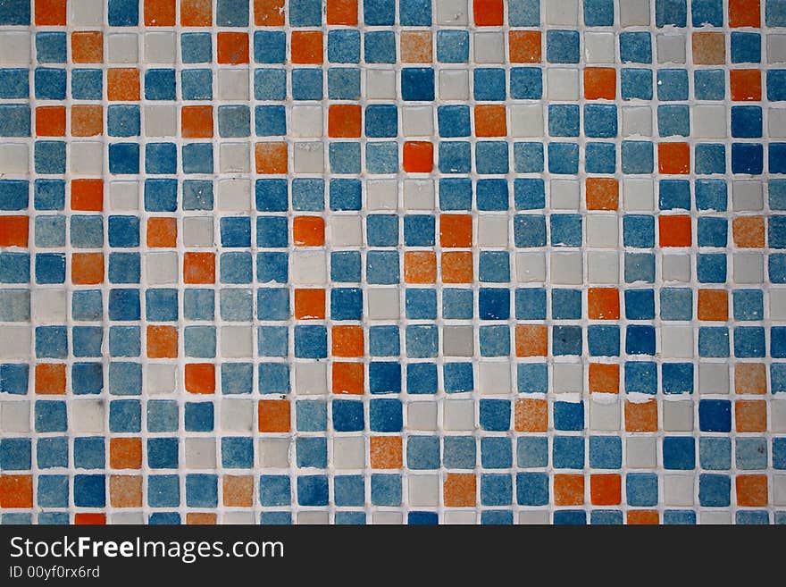 Blue, orange, white tiles in bathroom. Blue, orange, white tiles in bathroom