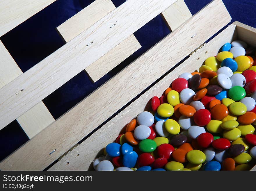 Many colored candies and a frame