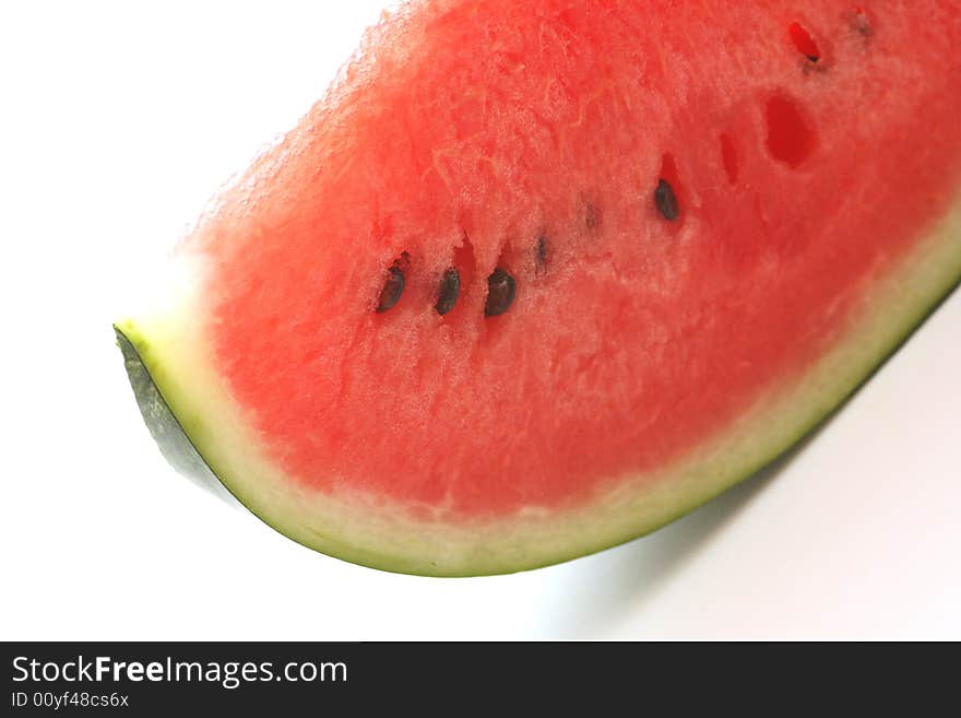 Appetizing slice of watermelon isolated on white