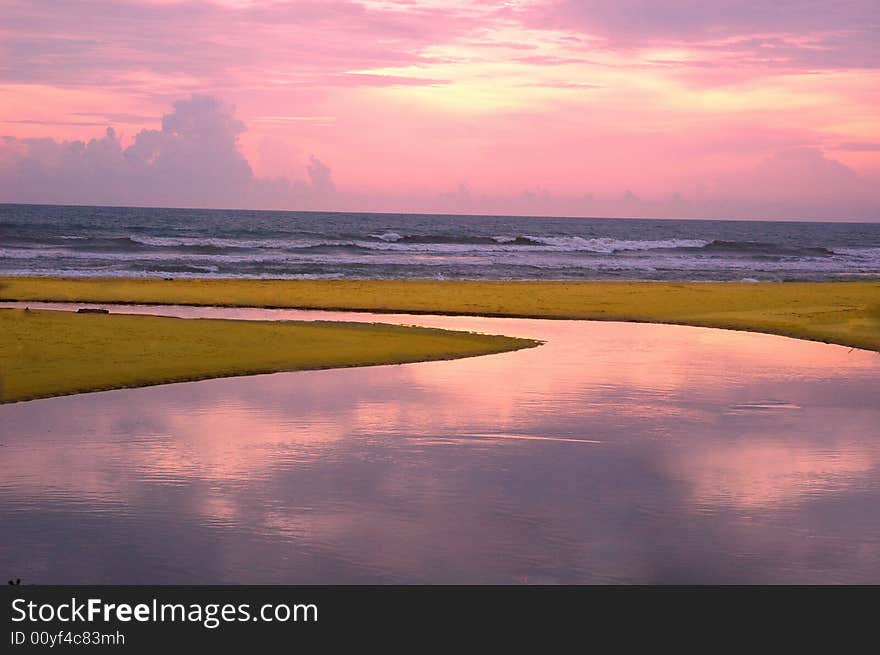 The reflection of the sun set on the sea shore at Goa sea beach. The reflection of the sun set on the sea shore at Goa sea beach.