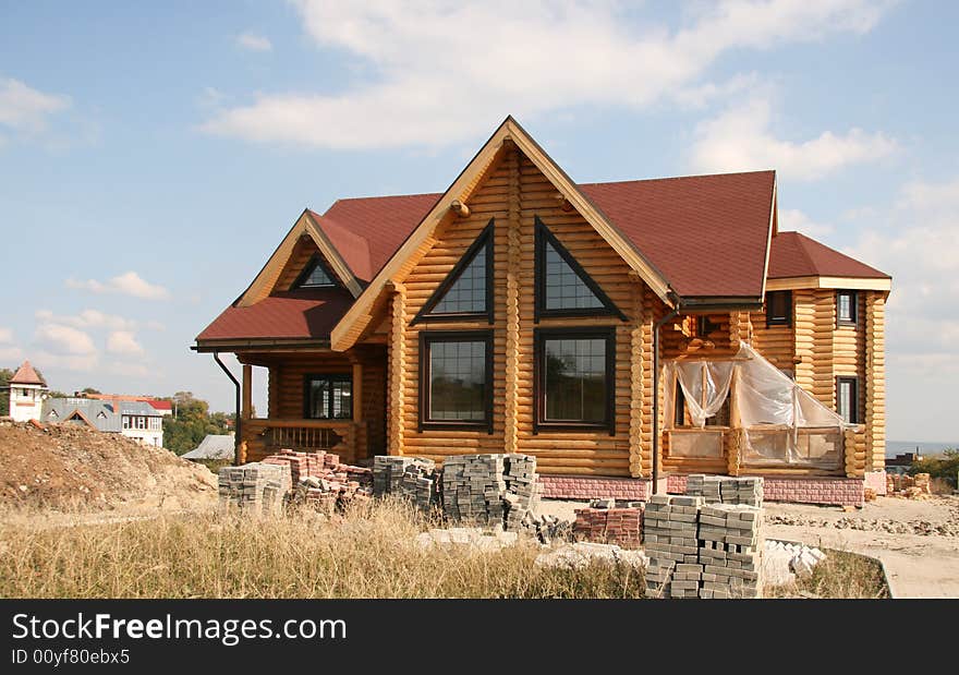 Construction of a new modern house from a tree. Construction of a new modern house from a tree