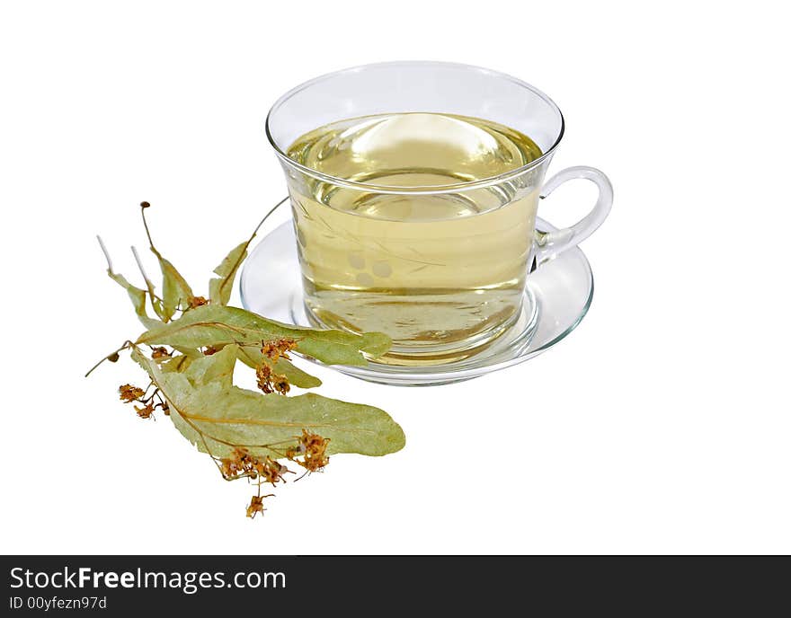 Glass cup and infusion herb isolated on white background. Glass cup and infusion herb isolated on white background