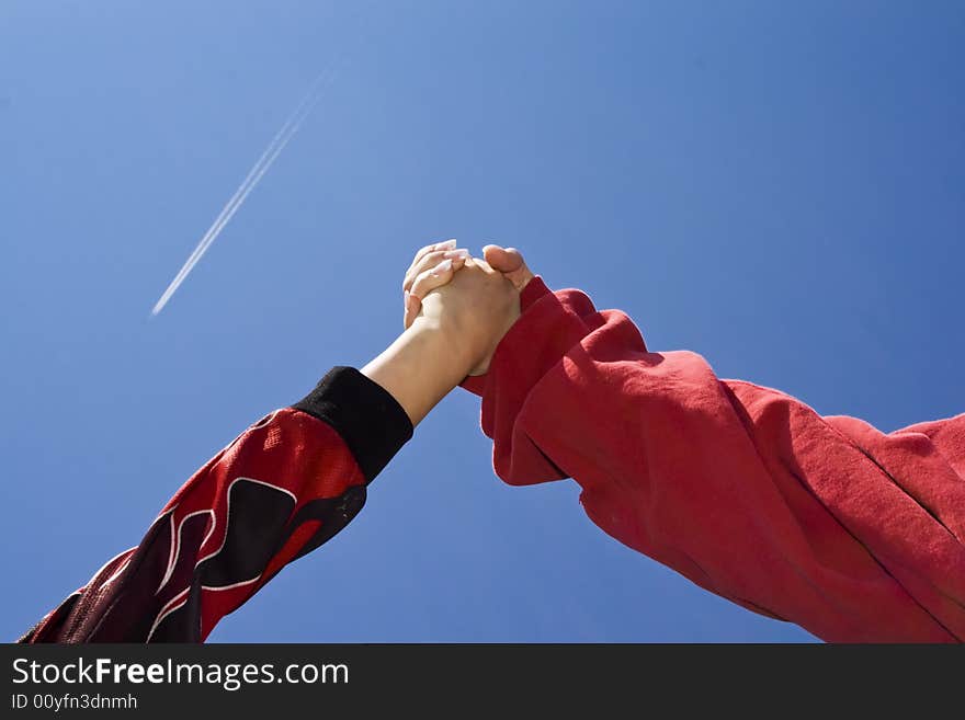 Raised Hands With Plane