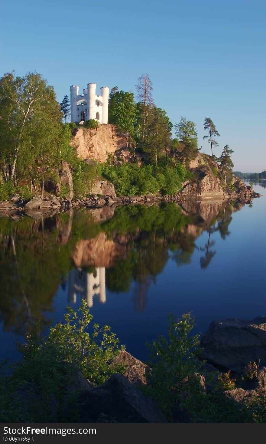 Russia Vyborg, park Monrepo, a chapel on island, early morning. Russia Vyborg, park Monrepo, a chapel on island, early morning