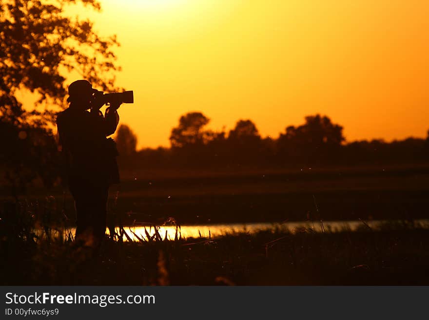 Silhouette Of The Photograper