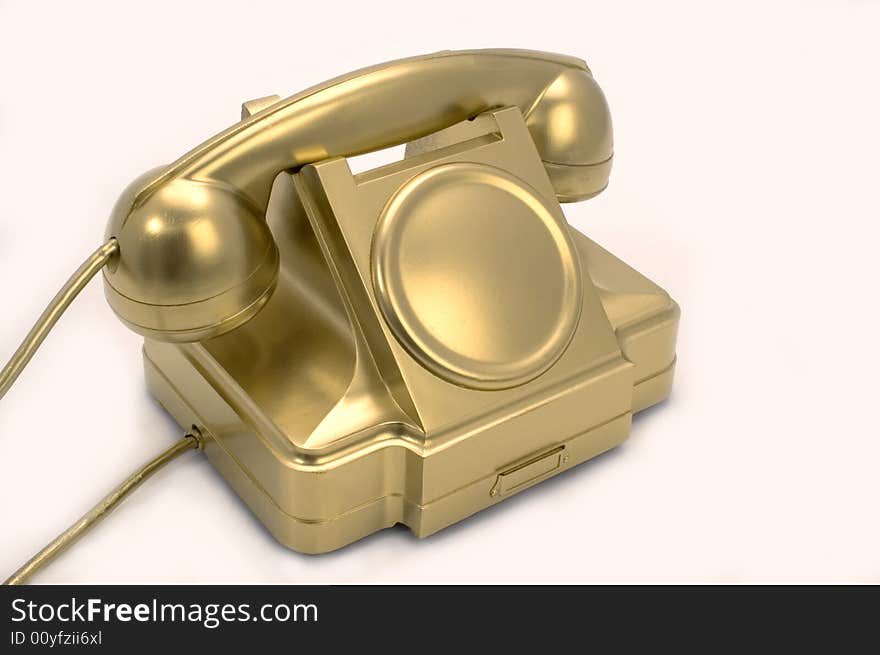 The gold telephone.