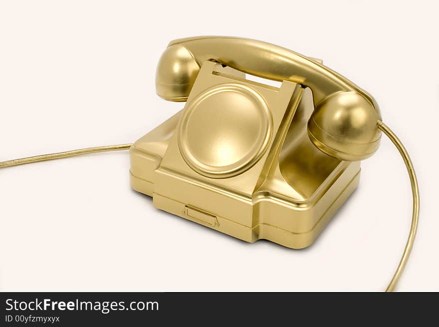 The gold telephone.