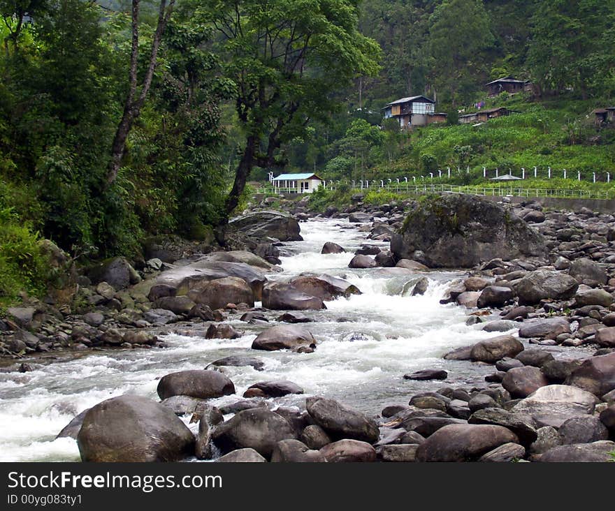 River Flowing From The Mountains