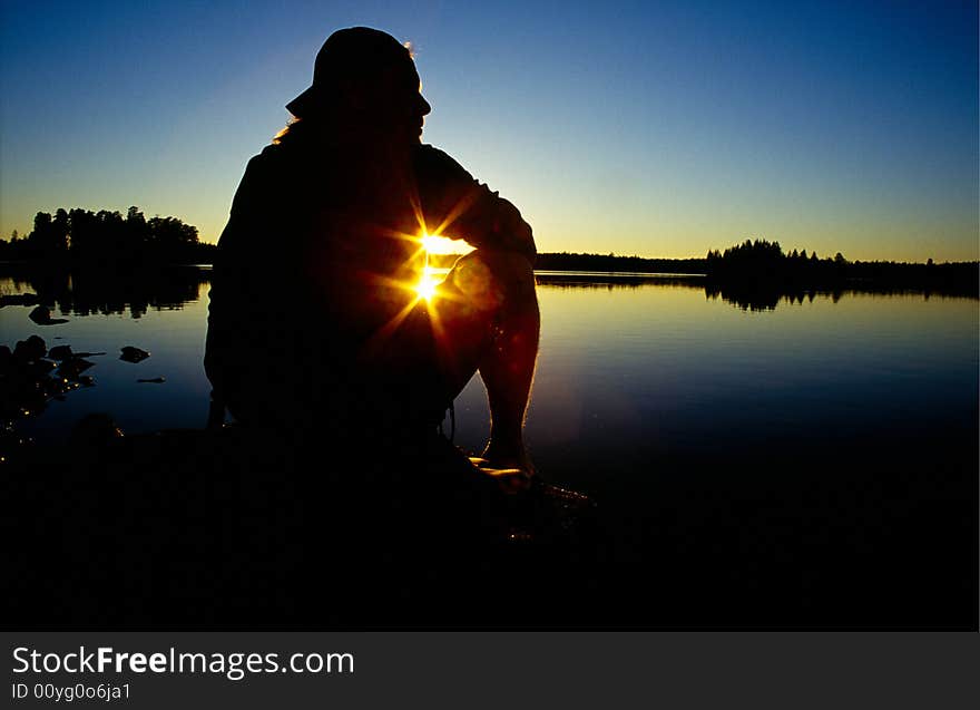 Man looking at the sunset