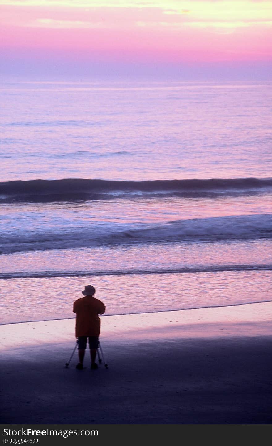 Taken on the East Coast, a photographer takes a photo of the sunrise. Taken on the East Coast, a photographer takes a photo of the sunrise.